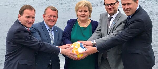 Sweden's Prime Minister Stefan Lofven (L-R), with his counterparts Lars Lokke Rasmussen of Denmark, Erna Solberg of Norway, Juha Sipila of Finland and Bjarni Benediktsson of Iceland hold a soccer ball during their meeting in Bergen, Norway May 29, 2017. Picture taken May 29, 2017. Sweden's Prime Minister Stefan Lofven (L-R), with his counterparts Lars Lokke Rasmussen of Denmark, Erna Solberg of Norway, Juha Sipila of Finland and Bjarni Benediktsson of Iceland hold a soccer ball during their meeting in Bergen, Norway May 29, 2017. Picture taken May 29, 2017. - Sputnik International
