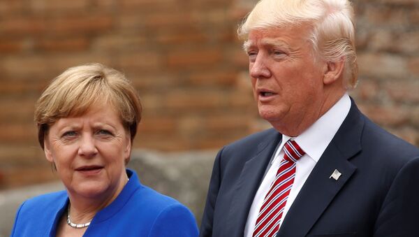 US President Donald Trump and German Chancellor Angela Merkel pose during a group photo at the G7 summit in Taormina, Sicily, Italy, 26 May  2017.  - Sputnik International