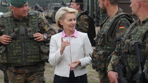 German Defense Minister Ursula von der Leyen speaks with German soldiers after the NATO Noble Jump exercise on a training range near Swietoszow Zagan, Poland, Thursday, June 18, 2015. - Sputnik International