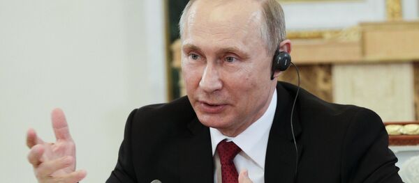 Russian President Vladimir Putin speaks during a meeting with representatives of international news agencies in St. Petersburg, Russia, June 1, 2017. Russian President Vladimir Putin speaks during a meeting with representatives of international news agencies in St. Petersburg, Russia, June 1, 2017. - Sputnik International