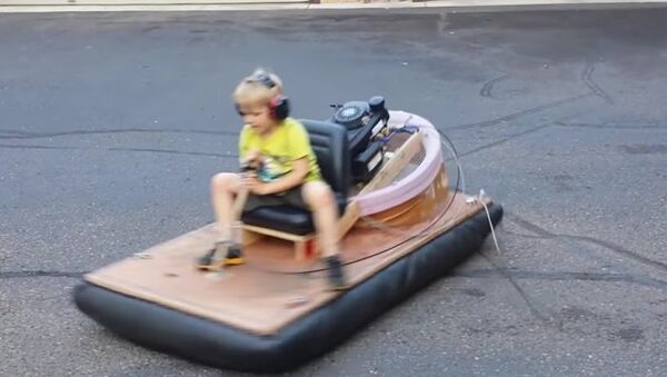 Oliver riding the hovercraft - Sputnik International