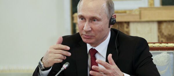 Russian President Vladimir Putin speaks during a meeting with representatives of international news agencies in St. Petersburg, Russia, June 1, 2017. Russian President Vladimir Putin speaks during a meeting with representatives of international news agencies in St. Petersburg, Russia, June 1, 2017. - Sputnik International