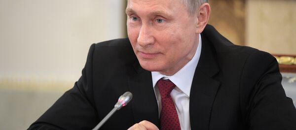 Russian President Vladimir Putin speaks during a meeting with representatives of international news agencies in St. Petersburg, Russia Russian President Vladimir Putin speaks during a meeting with representatives of international news agencies in St. Petersburg, Russia - Sputnik International