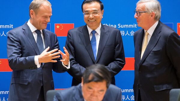 European Council President Donald Tusk, Chinese Premier Li Keqiang and EU Commission President Jean-Claude Juncker attend a signing ceremony during a EU-China Summit in Brussels, Belgium June 2, 2017. REUTERS/Olivier Hoslet/Pool - Sputnik International