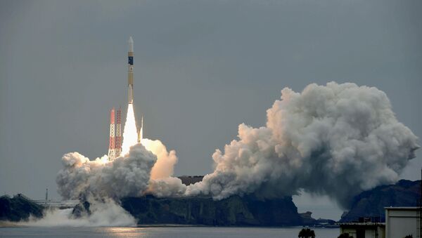 A H-IIA rocket, carrying a Michibiki 2 satellite, one of four satellites that will augment regional navigational systems, lifts off from the launching pad at Tanegashima Space Center on the southwestern island of Tanegashima, Japan, in this photo taken by Kyodo June 1, 2017. - Sputnik International
