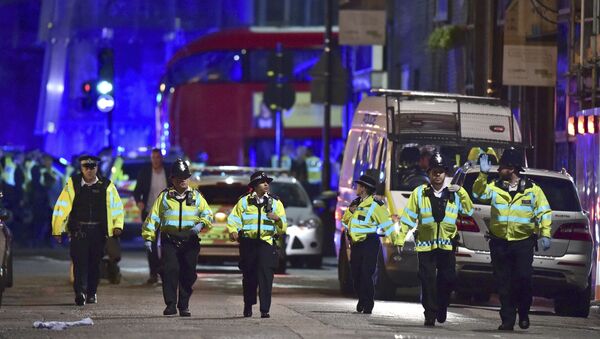 Police officers on Borough High Street as police are dealing with an incident on London Bridge in London, Saturday, June 3, 2017. - Sputnik International
