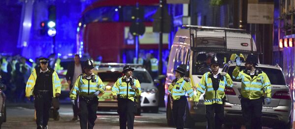 Police officers on Borough High Street as police are dealing with an incident on London Bridge in London, Saturday, June 3, 2017. Police officers on Borough High Street as police are dealing with an incident on London Bridge in London, Saturday, June 3, 2017. - Sputnik International