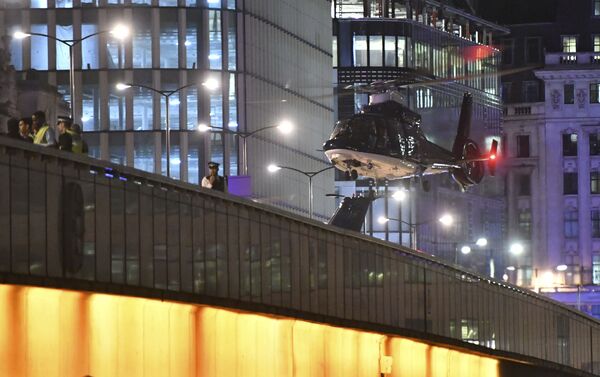 An helicopter lands on London Bridge after an attack in central London, Saturday, June 3, 2017. - Sputnik International