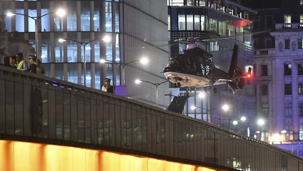 An helicopter lands on London Bridge after an attack in central London, Saturday, June 3, 2017. - Sputnik International