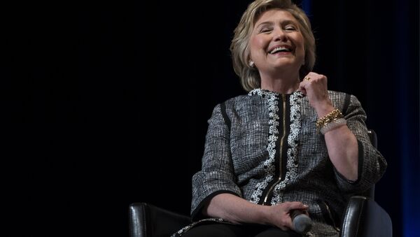 Former Secretary of State Hillary Clinton laughs while speaking during the Book Expo event in New York Thursday, June 1, 2017. - Sputnik International