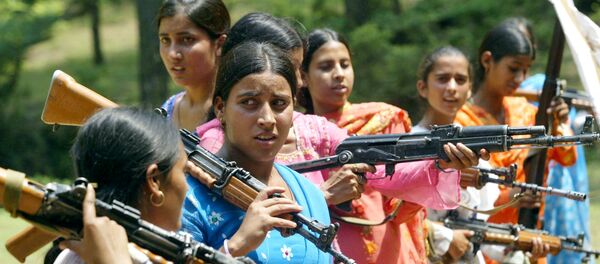 Women Village Defense Committee (VDC) members look on during a training session by the Indian Army at Sariya village, in Naushera sector, about 140 kilometers (88 miles) northwest of Jammu, India (File) - Sputnik International