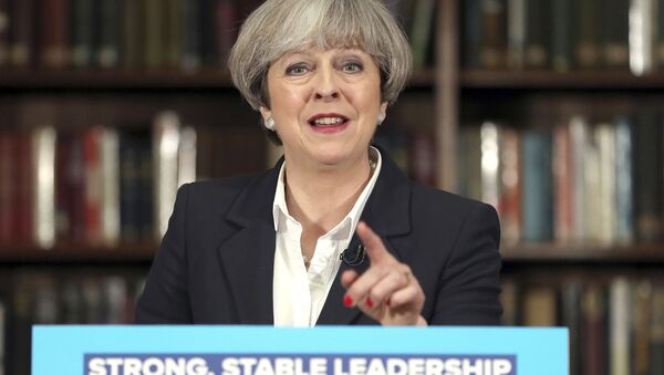 Britain's Prime Minister Theresa May makes a speech at the Royal United Services Institute for Defence and Security Studies in central London while on the General Election campaign trail. Monday June 5, 2017. - Sputnik International