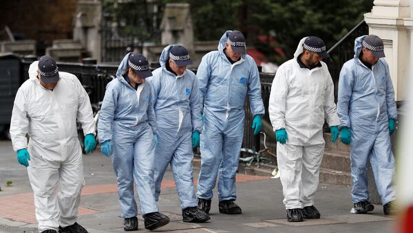 Forensics investigators work at the south end of London Bridge, near Borough market following an attack which left 7 people dead and dozens of injured in central London, Britain, June 5, 2017. - Sputnik International