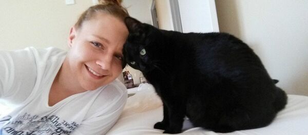 Reality Leigh Winner with her cat - Sputnik International