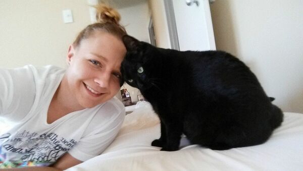 Reality Leigh Winner with her cat - Sputnik International