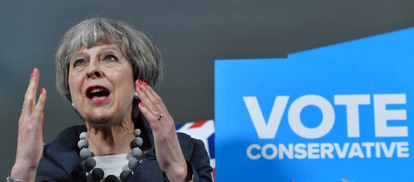 Britain's Prime Minister Theresa May delivers a speech during an election campaign visit to Langton Rugby Club in Stoke-on-Trent, June 6, 2017. Britain's Prime Minister Theresa May delivers a speech during an election campaign visit to Langton Rugby Club in Stoke-on-Trent, June 6, 2017. - Sputnik International