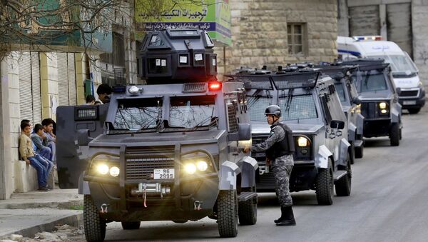 Jordanian security forces secure Hakama street during a raid in downtown Irbid, north of Amman, Jordan, Wednesday, March 2, 2016 - Sputnik International