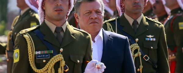 Jordan’s King Abdullah II, second left, reviews an honor guard during a celebrations marking the centennial of the Arab Revolt against the region’s ruling Ottoman Turks, in Jordan’s Red Sea port of Aqaba, Saturday, Jan. 23, 2016. - Sputnik International
