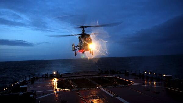Night flights of helicopters of a group of warships of the Russian Northern Fleet in the North Eastern Atlantic - Sputnik International