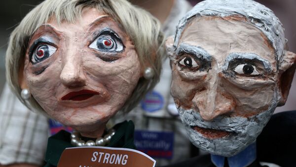 Puppets of Conservative Party leader Theresa May and Labour Party leader Jeremy Corbyn are seen during a protest against the BBC's broadcast restrictions on the Captain Ska song Liar Liar outside Broadcasting House in London, Britain June 2, 2017. - Sputnik International