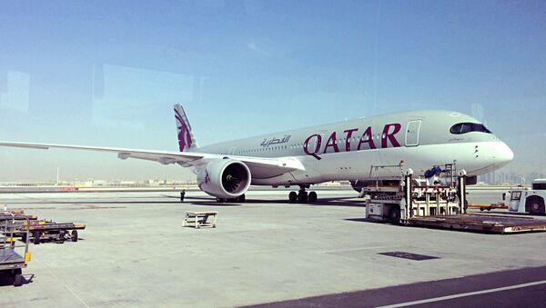 A parked Qatari plane in Hamad International Airport (HIA) in Doha, Qatar, Tuesday, June 6, 2017 - Sputnik International