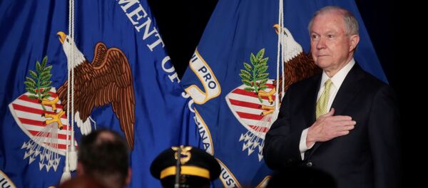 U.S. Attorney General Jeff Sessions is seen on stage as the Atlanta Police Department Honor Guard presents the colors while the National Anthem is played at the National Law Enforcement Conference on Human Exploitation in Atlanta, Georgia, U.S., June 6, 2017 U.S. Attorney General Jeff Sessions is seen on stage as the Atlanta Police Department Honor Guard presents the colors while the National Anthem is played at the National Law Enforcement Conference on Human Exploitation in Atlanta, Georgia, U.S., June 6, 2017 - Sputnik International