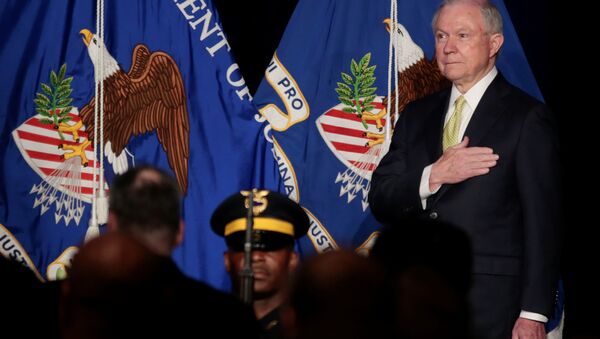 U.S. Attorney General Jeff Sessions is seen on stage as the Atlanta Police Department Honor Guard presents the colors while the National Anthem is played at the National Law Enforcement Conference on Human Exploitation in Atlanta, Georgia, U.S., June 6, 2017 - Sputnik International