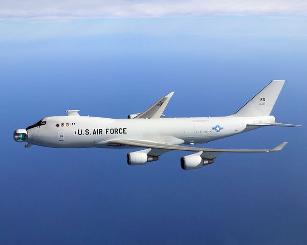 The since-abandoned YAL-1A Airborne Laser system in flight with its mirror unstowed The since-abandoned YAL-1A Airborne Laser system in flight with its mirror unstowed - Sputnik International