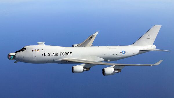 The since-abandoned YAL-1A Airborne Laser system in flight with its mirror unstowed - Sputnik International
