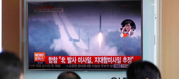 People watch a TV broadcast of a news report on North Korea firing what appeared to be several land-to-ship missiles off its east coast, at a railway station in Seoul, South Korea, June 8, 2017. People watch a TV broadcast of a news report on North Korea firing what appeared to be several land-to-ship missiles off its east coast, at a railway station in Seoul, South Korea, June 8, 2017. - Sputnik International