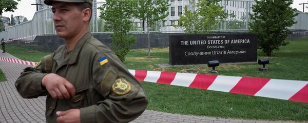 A member of the National Guard stands guard in front of the U.S. embassy in Kiev, Ukraine, June 8, 2017. A member of the National Guard stands guard in front of the U.S. embassy in Kiev, Ukraine, June 8, 2017. - Sputnik International