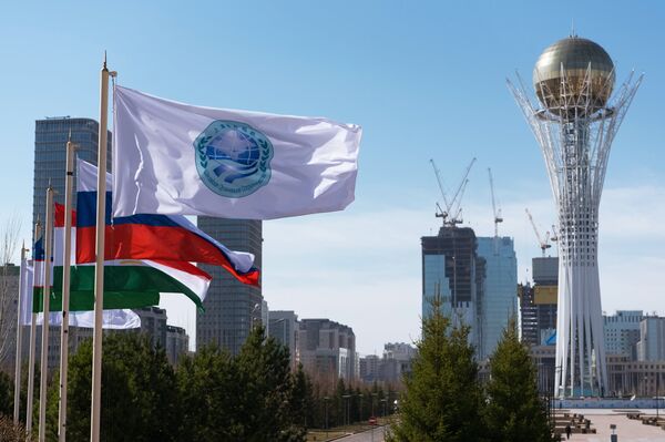 The flag of the Shanghai Cooperation Organization and flags of the SCO member states in Astana The flag of the Shanghai Cooperation Organization and flags of the SCO member states in Astana - Sputnik International