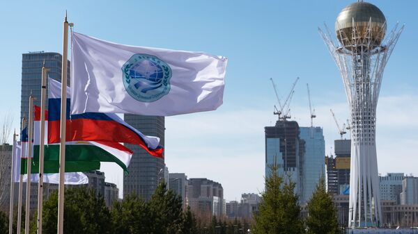The flag of the Shanghai Cooperation Organization and flags of the SCO member states in Astana - Sputnik International