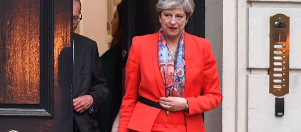 British Prime Minister Theresa May leaves the Conservative Party HQ in central London, on June 9, 2017, hours after the polls closed in the British general election. British Prime Minister Theresa May leaves the Conservative Party HQ in central London, on June 9, 2017, hours after the polls closed in the British general election. - Sputnik International