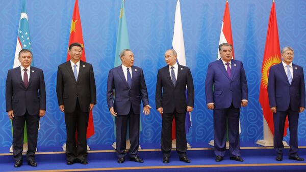 June 9, 2017. President Vladimir Putin poses for photographs with the participants of the meeting of the Council of Heads of State of the Shanghai Cooperation Organization (SCO). From left: President of Uzbekistan Shavkat Mirziyoyev, President of China Xi Jinping, President of Kazakhstan Nursultan Nazarbayev. From right: President of Kyrgyzstan Almazbek Atambayev, President of Tajikistan Emomali Rahmon. - Sputnik International