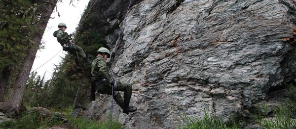 Servicemen during mountain training in the Yergaki training center at the foothills of the Western Sayan mountains. (File) Servicemen during mountain training in the Yergaki training center at the foothills of the Western Sayan mountains. (File) - Sputnik International
