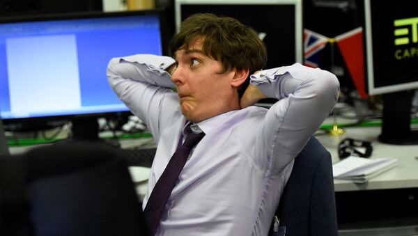 An ETX Capital trader reacts as he watches the results for Britain's election in London, June 8, 2017. - Sputnik International