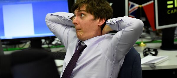 An ETX Capital trader reacts as he watches the results for Britain's election in London, June 8, 2017. - Sputnik International