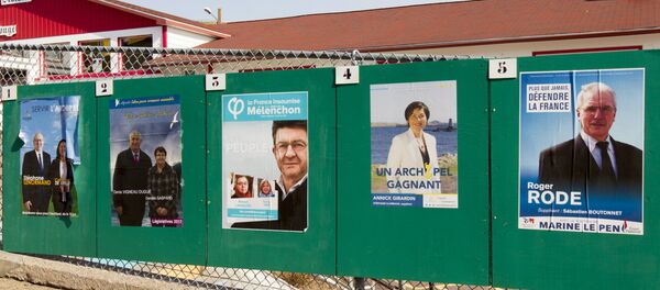 Campaign posters for the French legislative elections are displayed outside a polling station in the French overseas territory of Saint-Pierre Campaign posters for the French legislative elections are displayed outside a polling station in the French overseas territory of Saint-Pierre - Sputnik International
