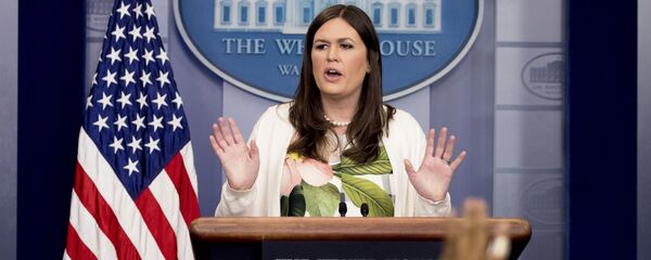 White House deputy press secretary Sarah Huckabee Sanders talks to the media during the daily press briefing at the White House in Washington - Sputnik International