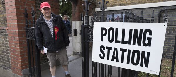 A supporter of the Labour Party leaves a polling station in London after voting the United Kingdom general election of 2017 A supporter of the Labour Party leaves a polling station in London after voting the United Kingdom general election of 2017 - Sputnik International