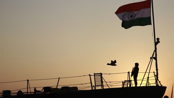 Indian navy person stands guard on board war ship Godavari during its decommissioning at the naval dockyard in Mumbai, India, Wednesday, Dec. 23, 2015 - Sputnik International