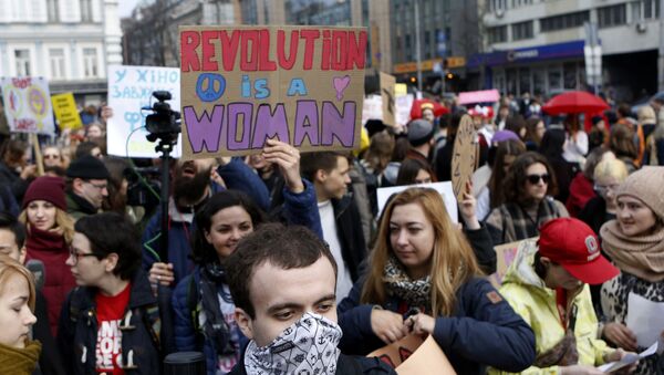 Ukrainian feminists march on the occasion of the International Women's Day in Kiev, Ukraine, Wednesday, March 8, 2017. Ukrainian feminists advocate for gender equality and protest against violence against women - Sputnik International