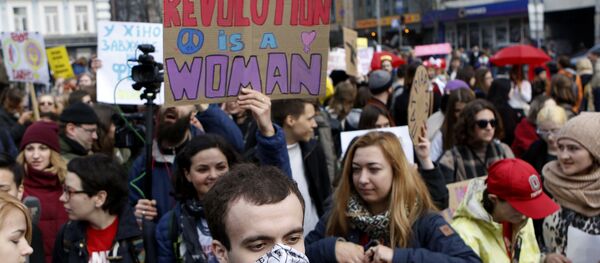 Ukrainian feminists march on the occasion of the International Women's Day in Kiev, Ukraine, Wednesday, March 8, 2017. Ukrainian feminists advocate for gender equality and protest against violence against women Ukrainian feminists march on the occasion of the International Women's Day in Kiev, Ukraine, Wednesday, March 8, 2017. Ukrainian feminists advocate for gender equality and protest against violence against women - Sputnik International