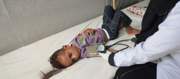 A nurse attends to a boy infected with cholera at a hospital in the Red Sea port city of Hodeidah, Yemen May 14, 2017 A nurse attends to a boy infected with cholera at a hospital in the Red Sea port city of Hodeidah, Yemen May 14, 2017 - Sputnik International