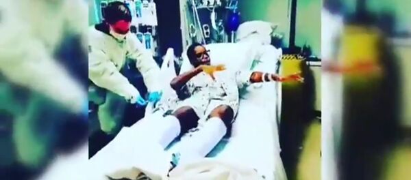 Young patient dances with nurses after heart transplant Young patient dances with nurses after heart transplant - Sputnik International