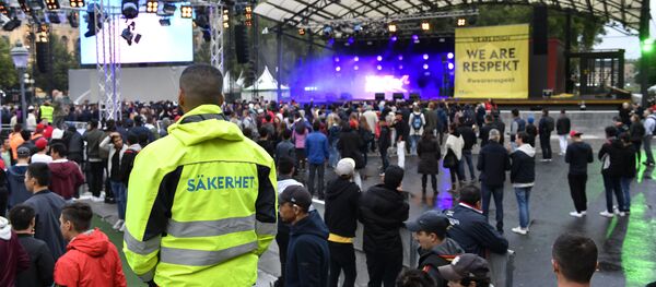 A security officer stand guards the festival We are Stockholm in central Stockholm on August 18, 2016 A security officer stand guards the festival We are Stockholm in central Stockholm on August 18, 2016 - Sputnik International
