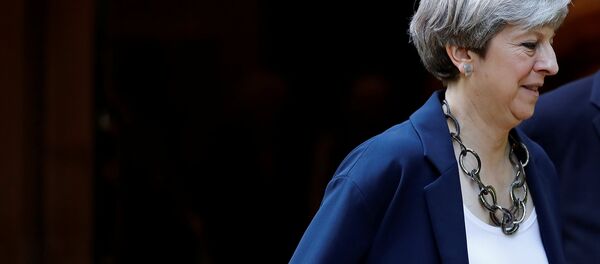 Britain's Prime Minister Theresa May leaves after a church service in Sonning, Britain June 11, 2017. - Sputnik International