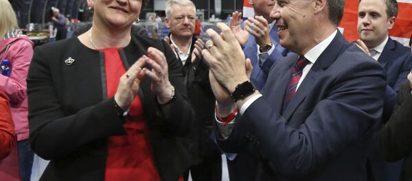 Democratic Unionist Party (DUP) leader Arlene Foster, left, and deputy leader Nigel Dodds cheer as Emma Little Pengelly is elected to the South Belfast constituency at the Titanic exhibition centre in Belfast where counting is taking place in the general election, Friday June 9, 2017. Democratic Unionist Party (DUP) leader Arlene Foster, left, and deputy leader Nigel Dodds cheer as Emma Little Pengelly is elected to the South Belfast constituency at the Titanic exhibition centre in Belfast where counting is taking place in the general election, Friday June 9, 2017. - Sputnik International