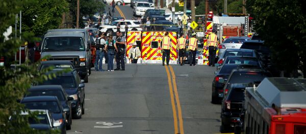 Police survey a shooting scene after a gunman opened fire on Republican members of Congress during a baseball practice near Washington in Alexandria, Virginia, June 14, 2017 Police survey a shooting scene after a gunman opened fire on Republican members of Congress during a baseball practice near Washington in Alexandria, Virginia, June 14, 2017 - Sputnik International